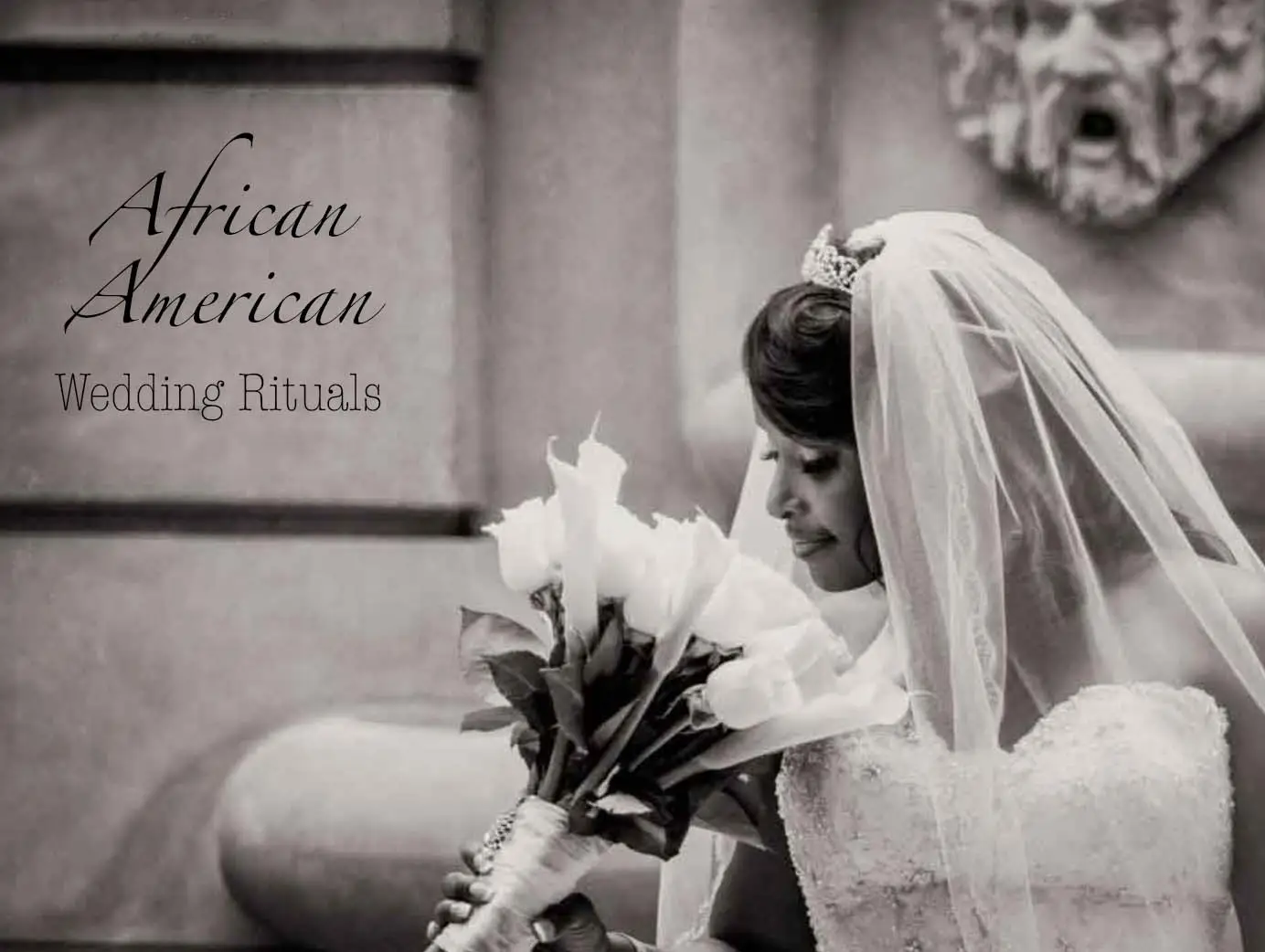 A bride holding a bouquet of white roses during a wedding ceremony featuring African American wedding rituals, led by Maryland officiant Starlene